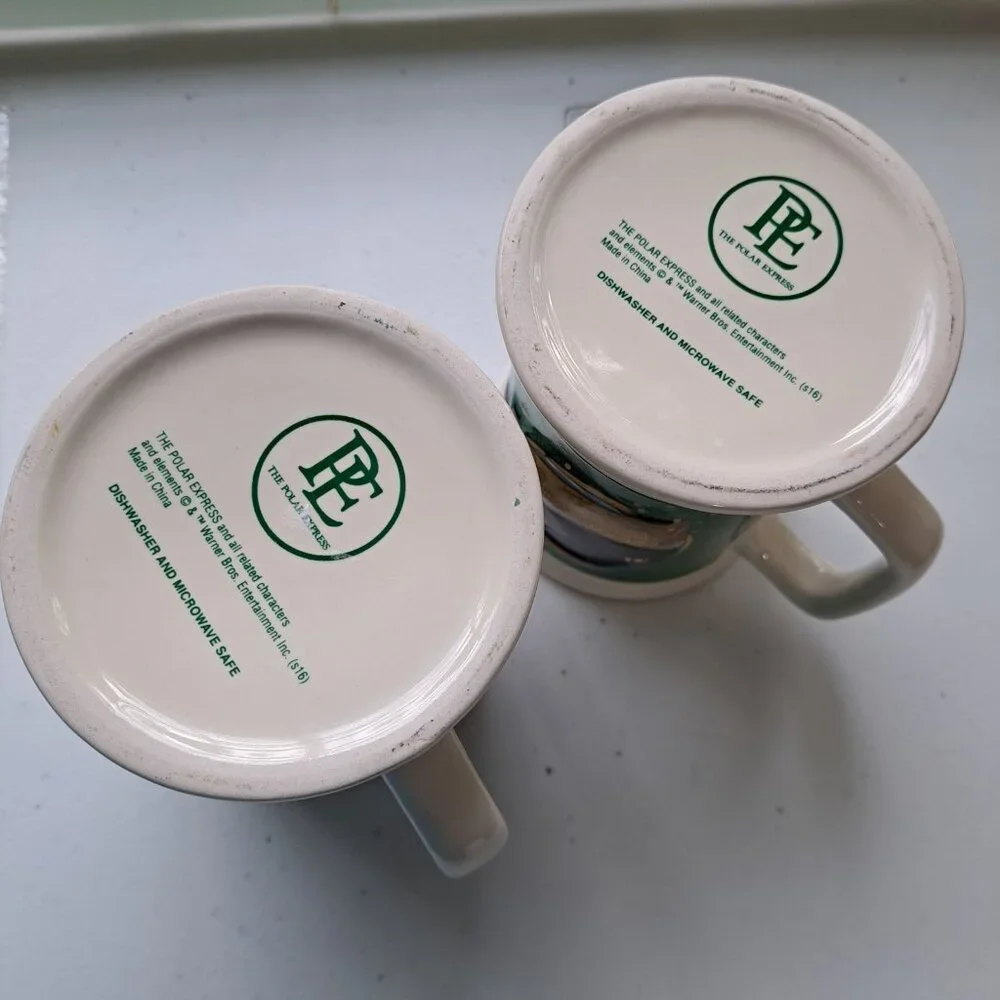 Set of 2 Polar Express Hot Chocolate Mugs Christmas Train Decor Bell Still Rings